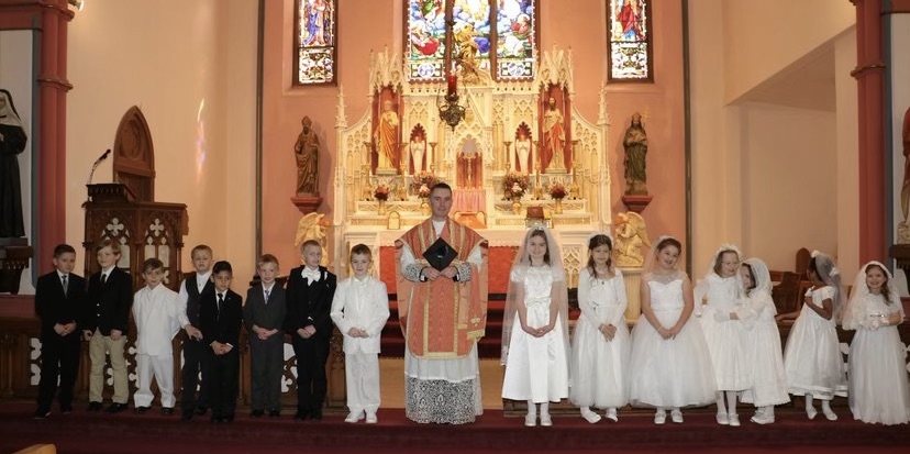 A Eucharistic Joy for Laetare Sunday: First Communions in Rockford